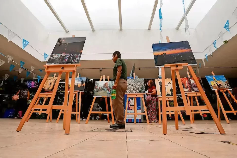 Mercados de la capital reciben muestra itinerante de fotografía
